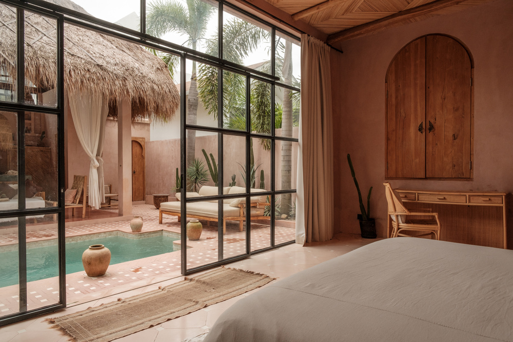 Tropical Home View of a Tropical Poolside and Bedroom